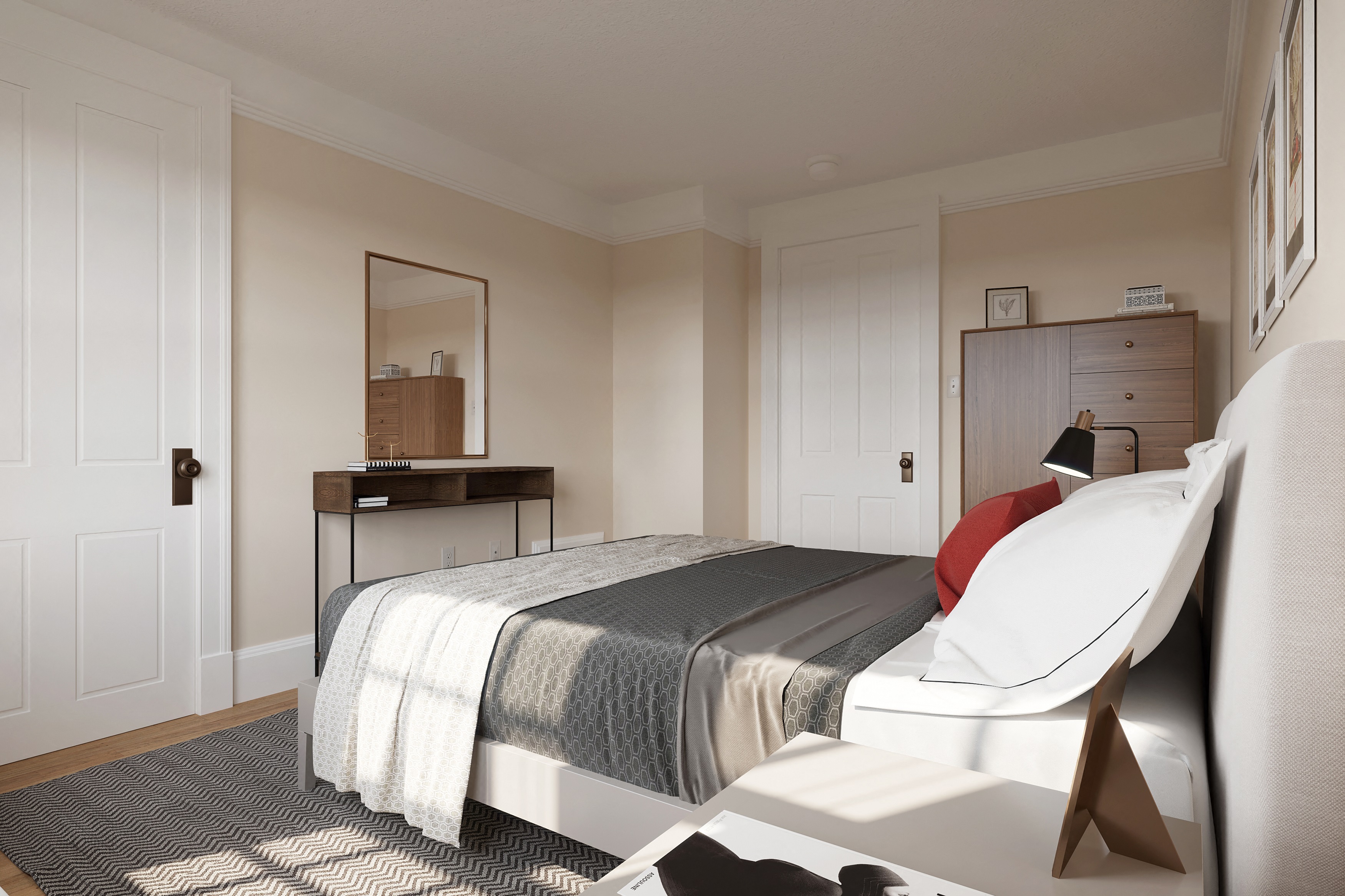 a bedroom with a bed and a white chair