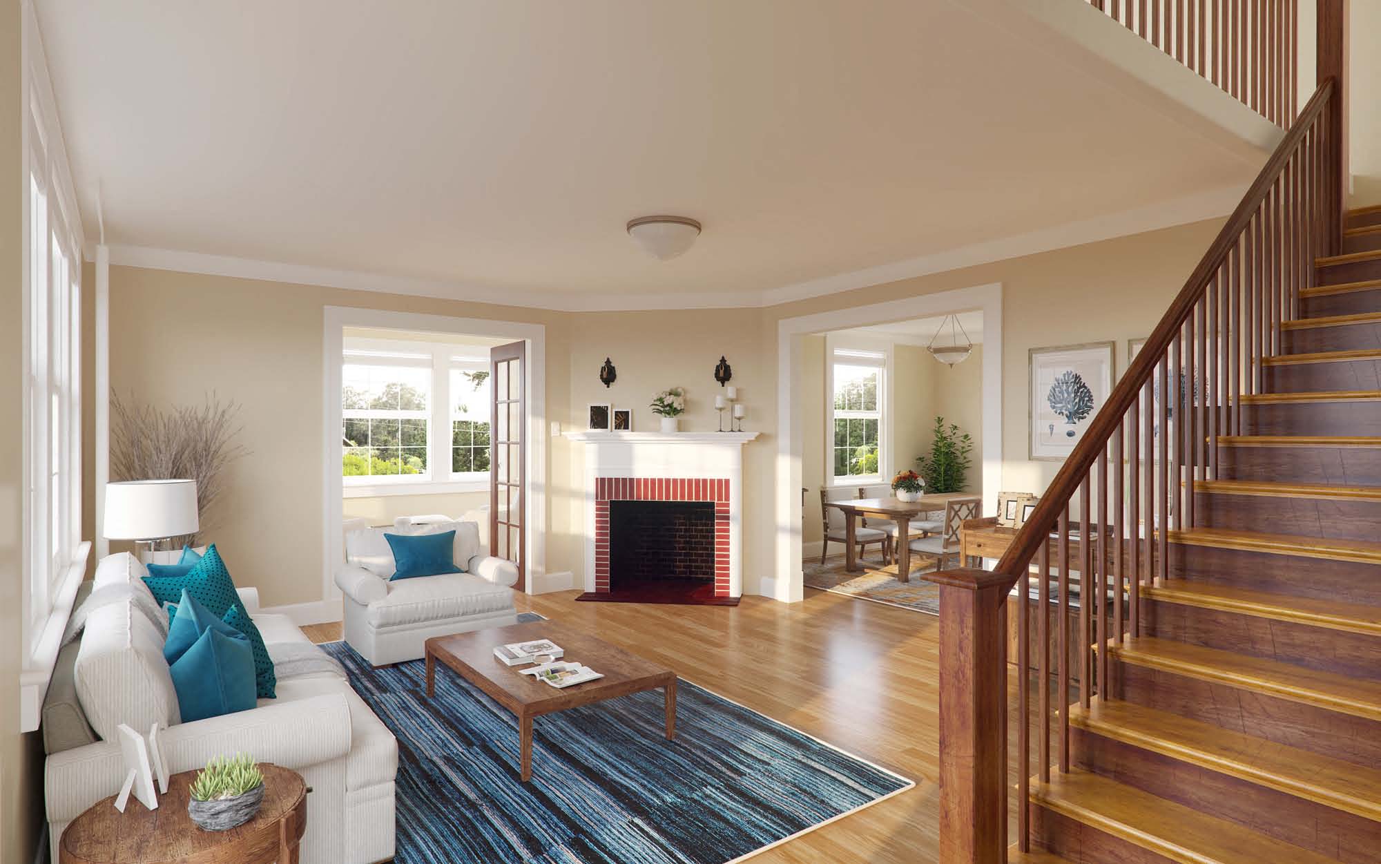 a living room with a fireplace and a staircase