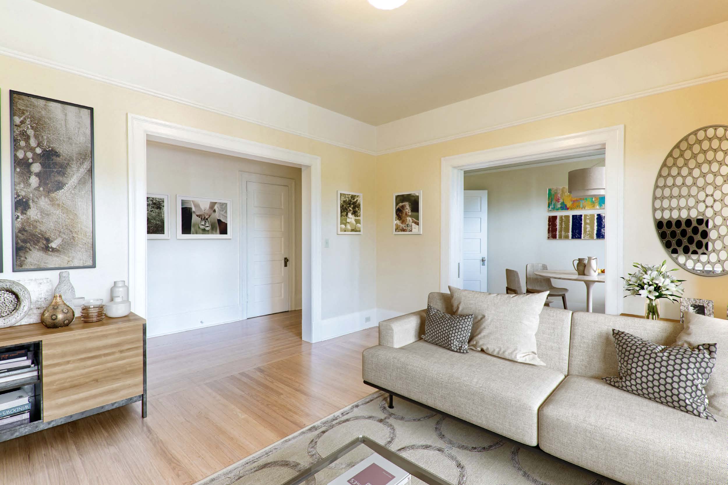 a living room with a couch and a table