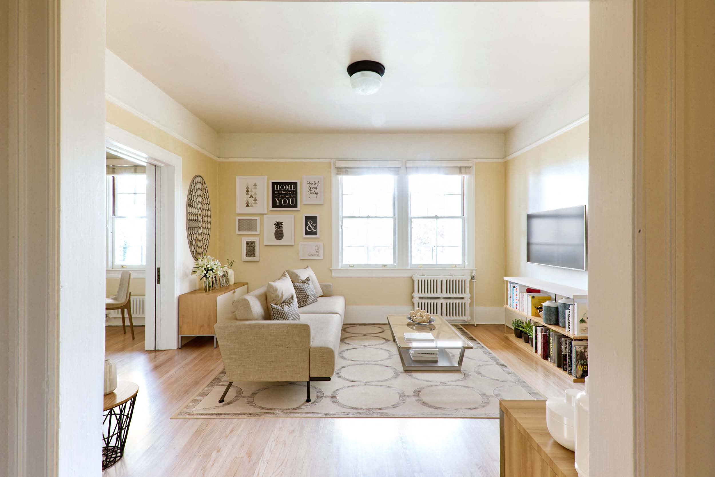a living room with a couch and a tv