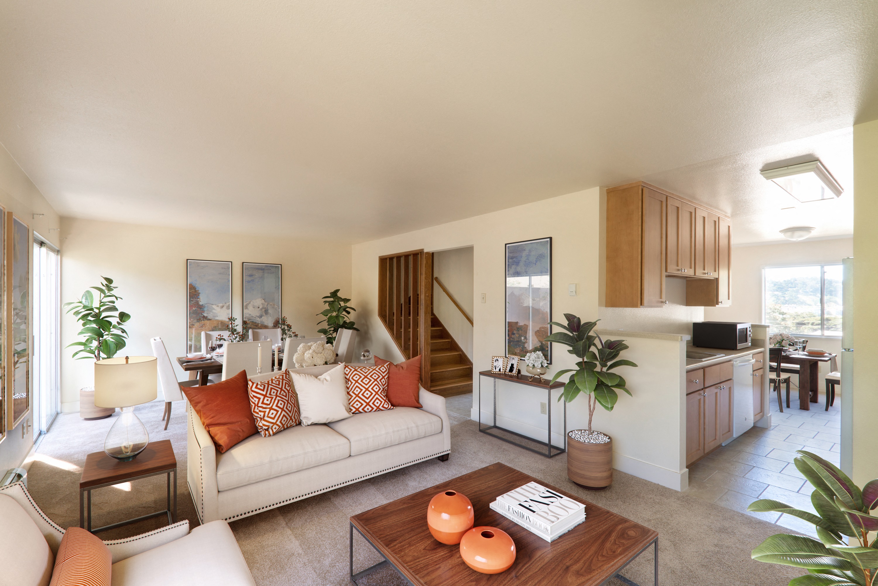 a living room with a couch and a table