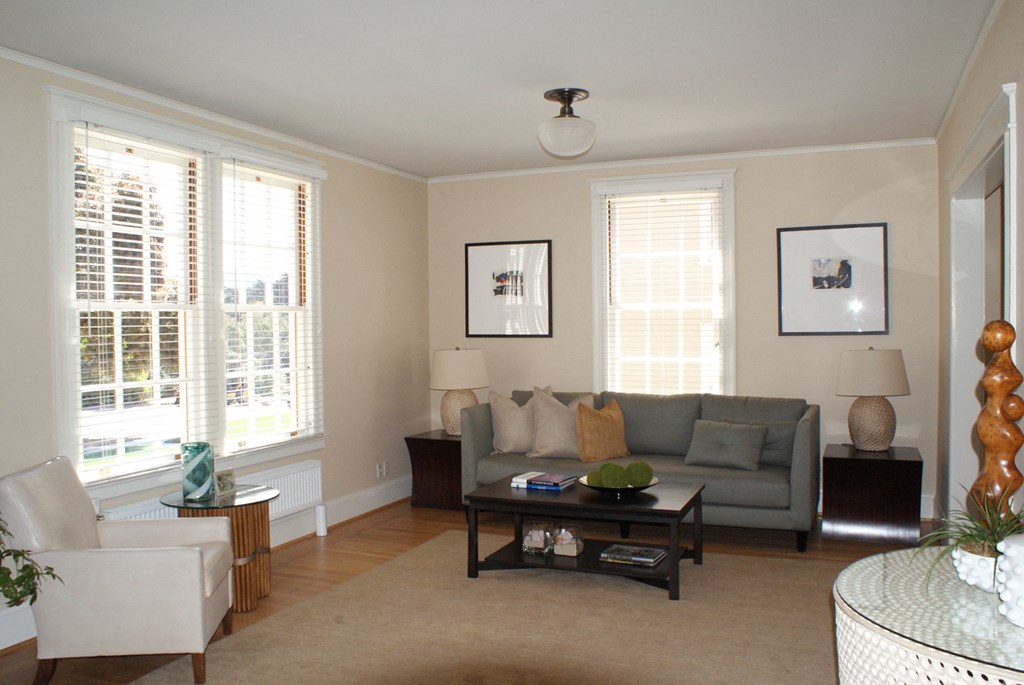 a living room with a couch and a table