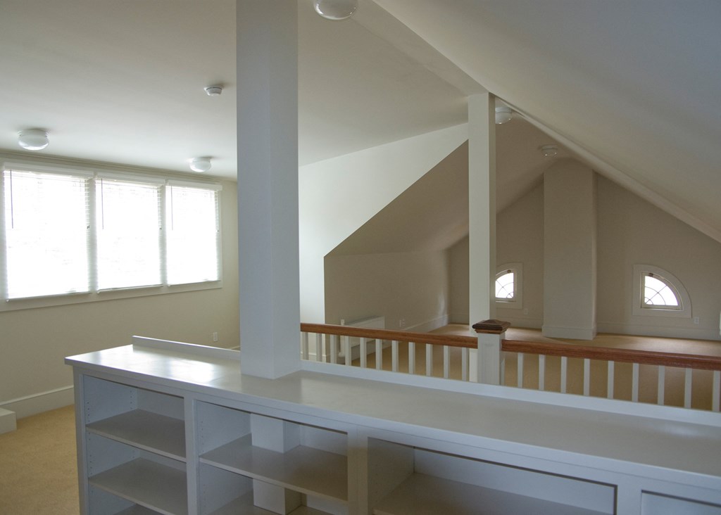 a view of the upstairs area of a house from the loft