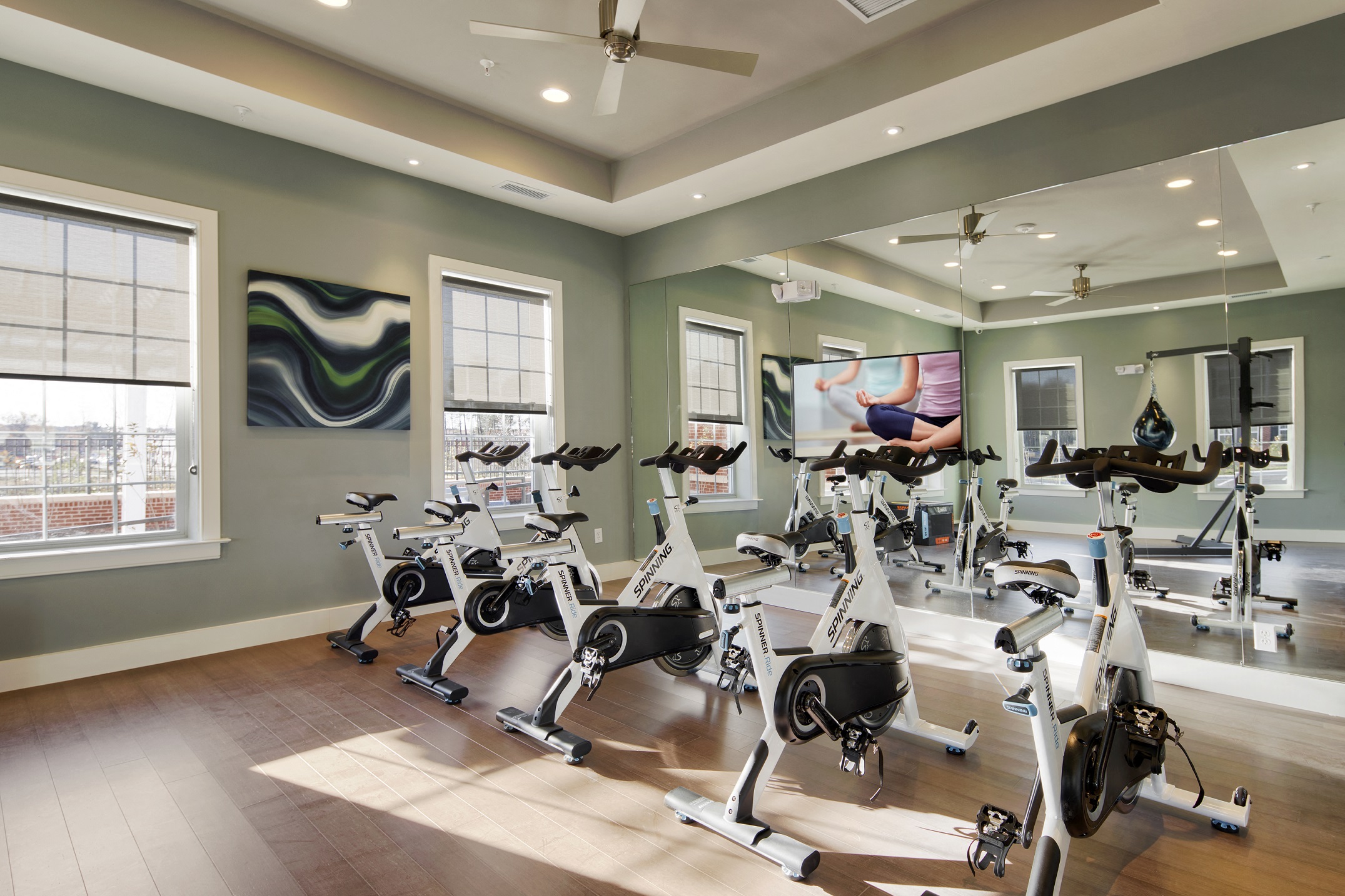 a gym with treadmills and other exercise equipment