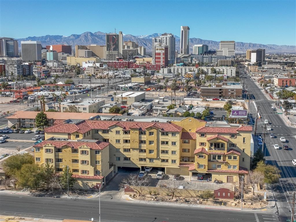 an aerial view of the city with buildings and skyscrapers