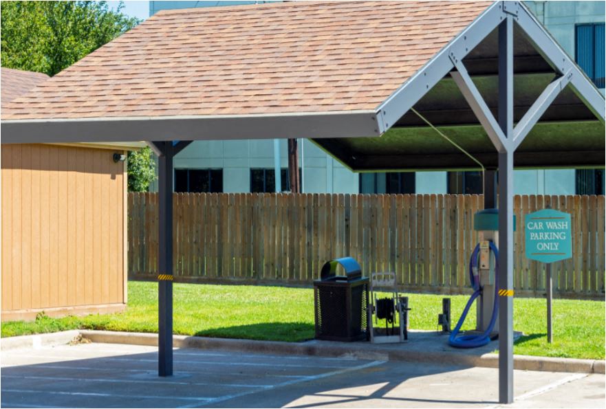 a gas station with a roofed pavilion