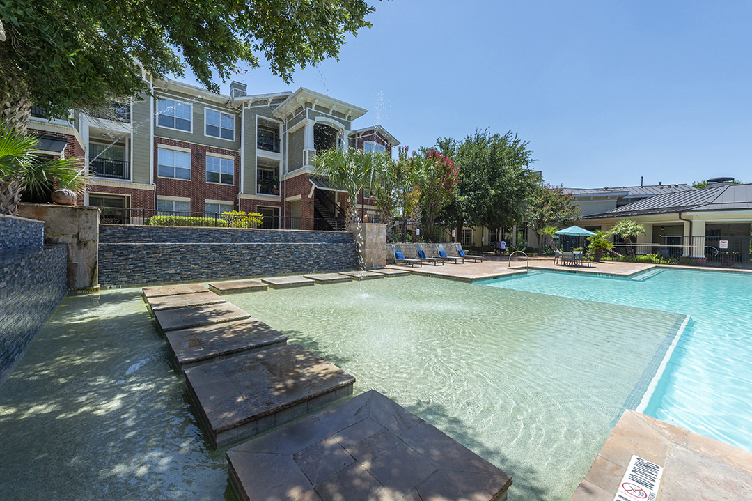 our apartments have a large resort style pool with lounge chairs