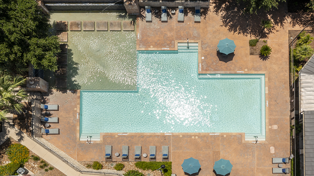 an aerial view of the pool at the resort at longboat key club