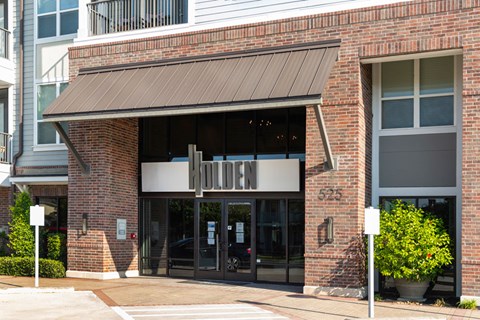 A building with a sign that says "HOTEL" on it.
