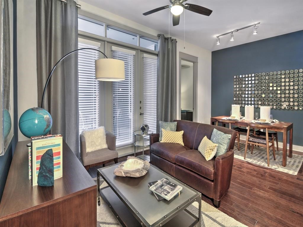 a living room with a couch and a table