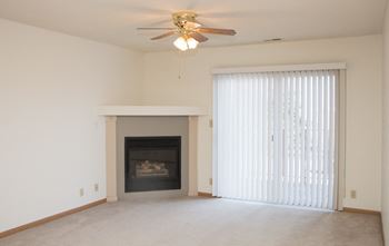 Cozy gas fireplace in living room at Northridge Heights apartments in north Lincoln