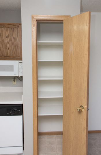 Pantry storage with shelves for storing food at Northridge Heights in north Lincoln, Nebraska 68504