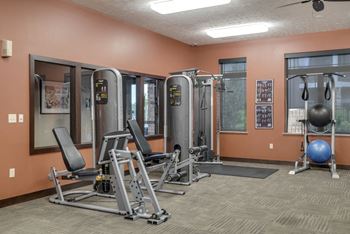Work out equipment and machines in the 24 hour fitness center at The Villas at Wilderness Ridge in South Lincoln, Nebraska