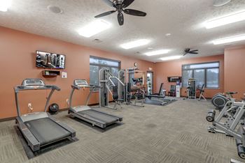 Work out equipment and machines in the 24 hour fitness center at The Villas at Wilderness Ridge in South Lincoln, Nebraska
