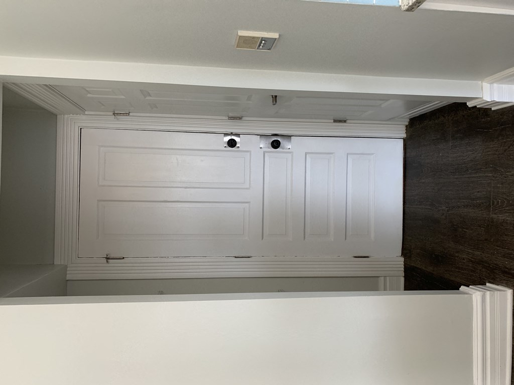the door to the laundry room is primed and ready to be painted