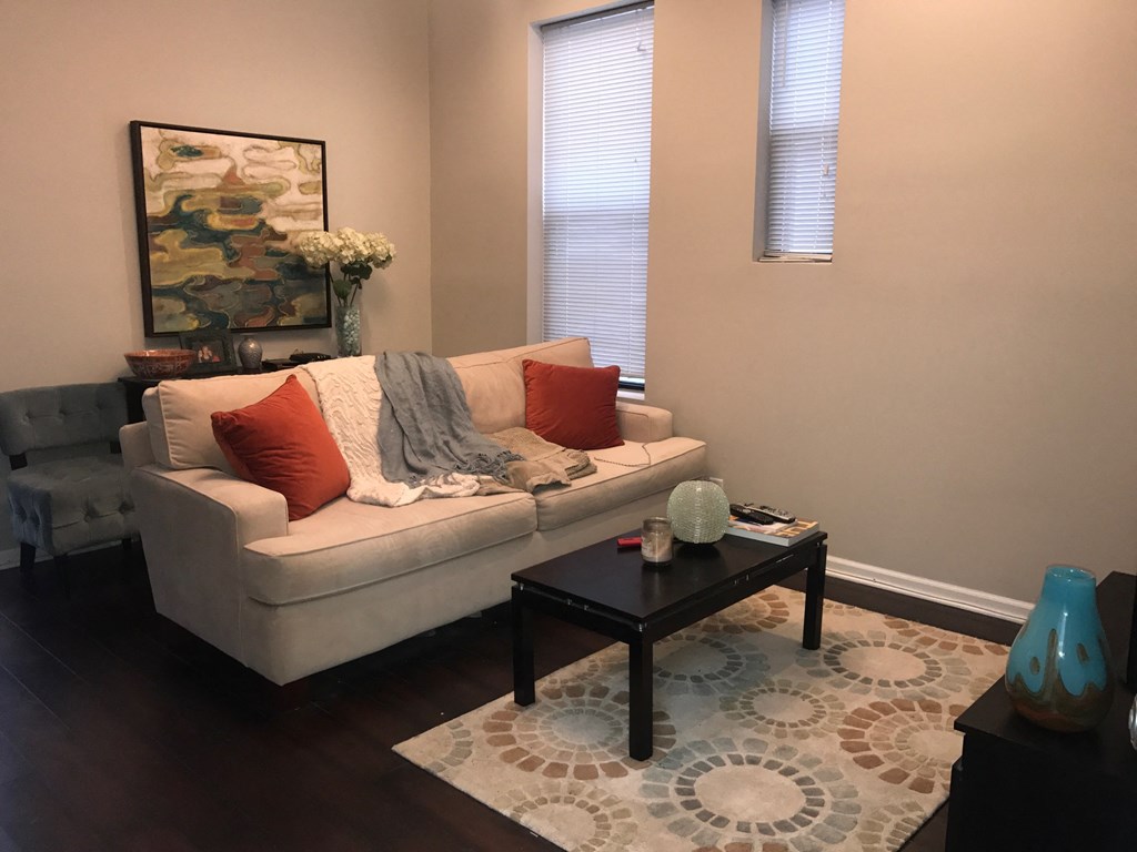 a living room with a couch and a coffee table