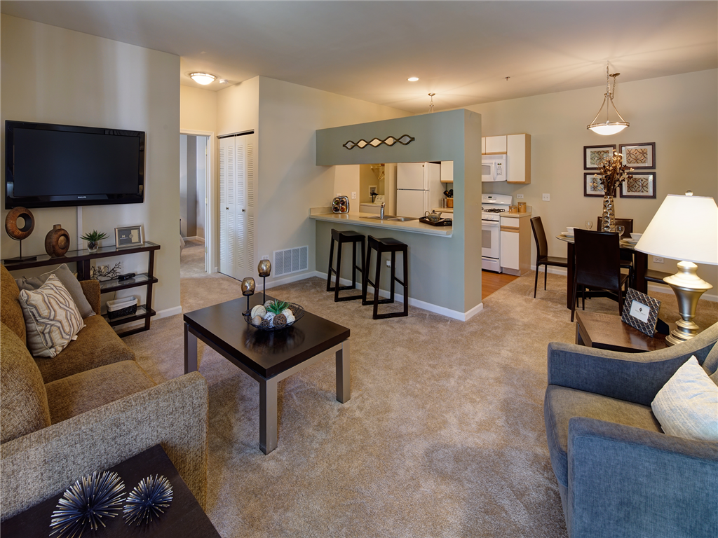 a living room with a couch and a table