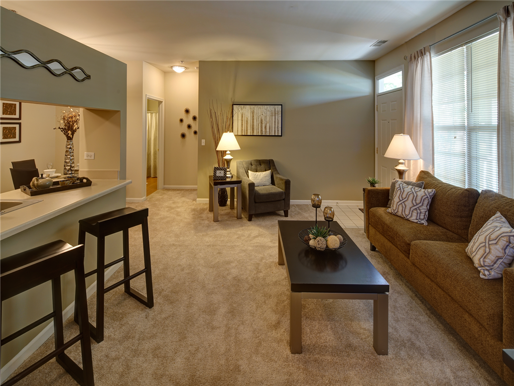 a living room with a couch and a table