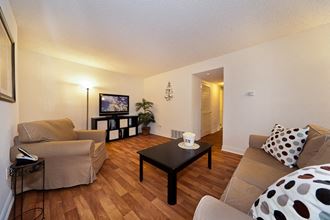 a living room with a couch and a coffee table