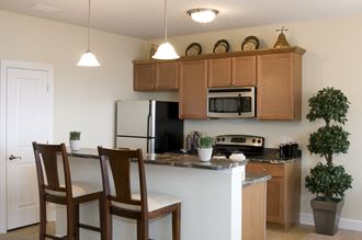 Kitchen with Island Kitchen with Island at Long Pond Shores Waterfront Apartments, Rochester, NY