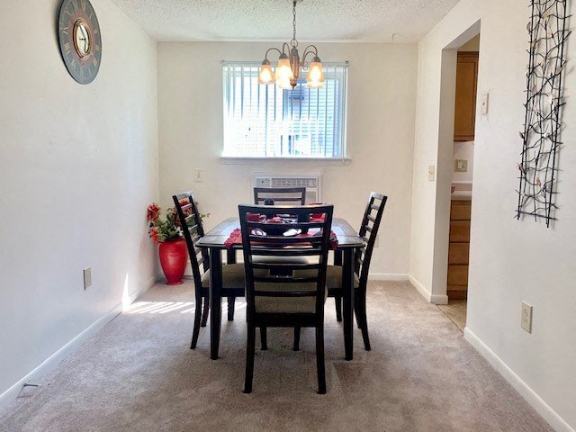 an empty dining room with a table and chairs
