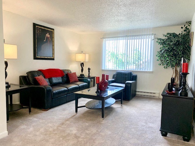 a living room with a couch and a table