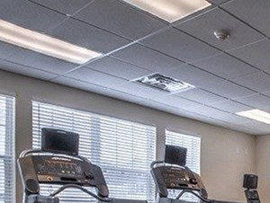 Fitness Center with Cardio Equipment and Free Weights Fitness Center with Cardio Equipment and Free Weights at Townhomes at Pleasant Meadows, New York