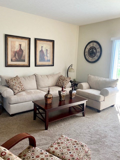 a living room with a couch and a table