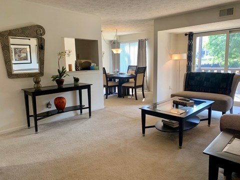 a living room with a couch and a table