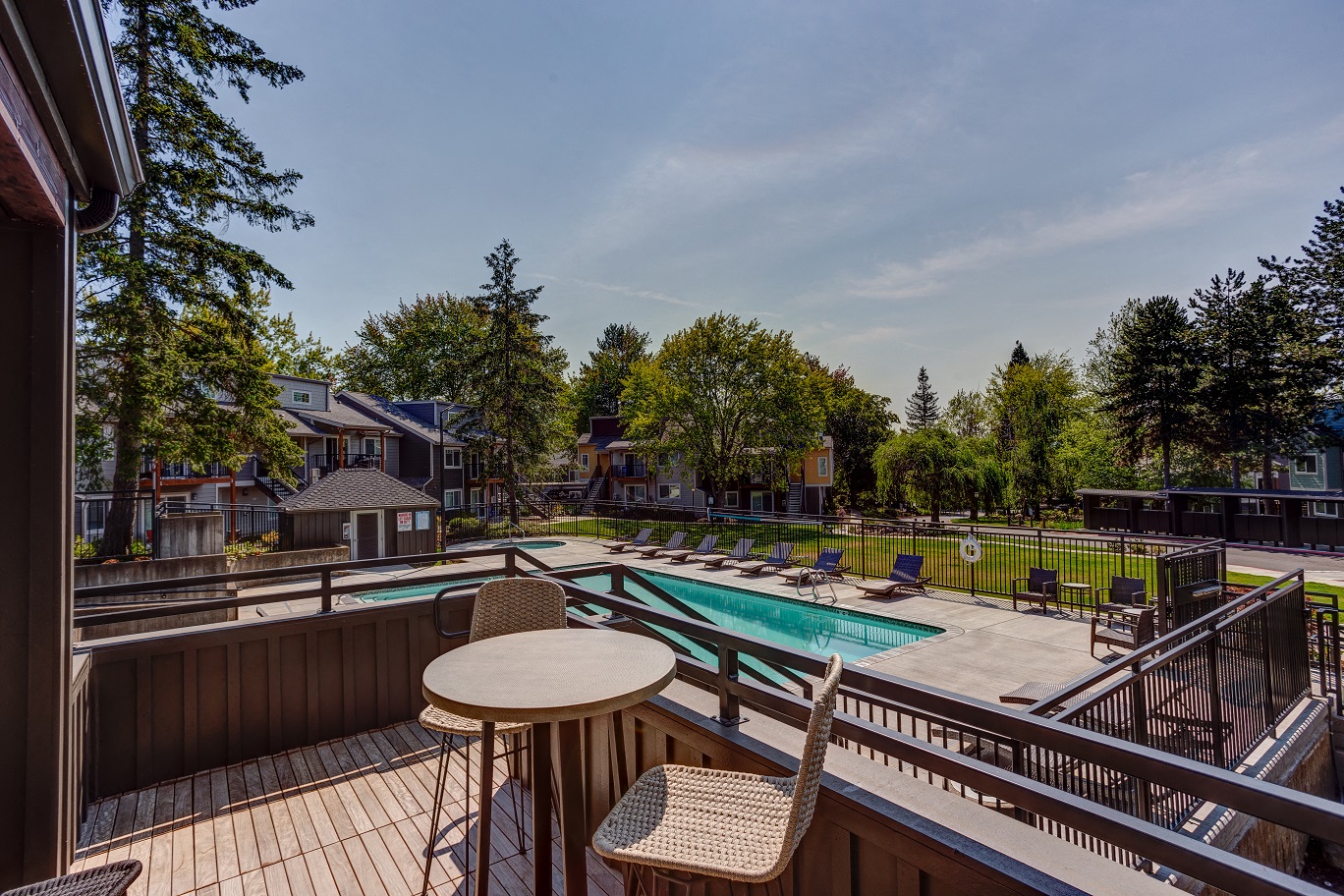 the deck overlooking the pool at our apartments