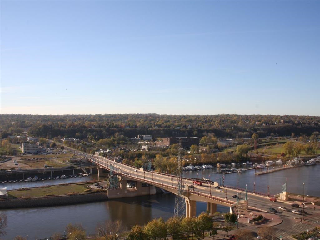 a bridge over a river with a train on it