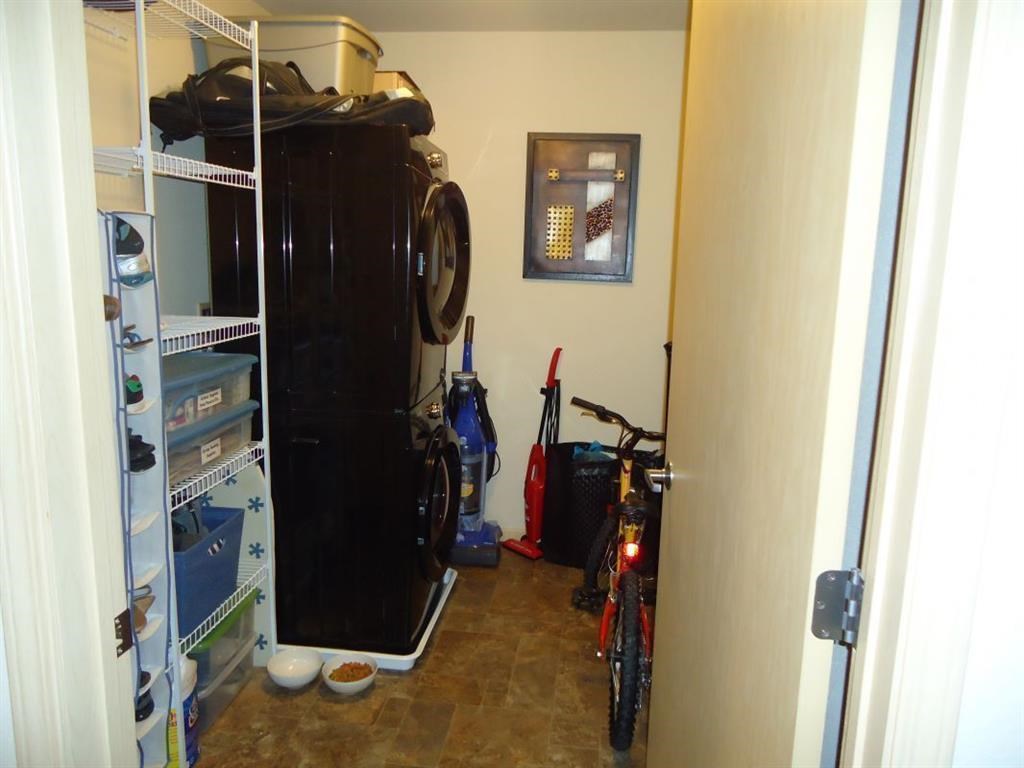 a room with a closet and a bike in it