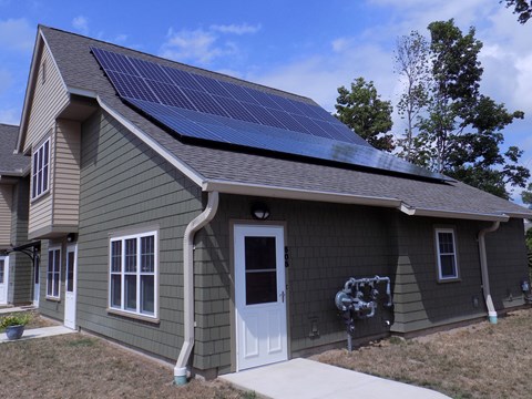 a house with solar panels on the roof