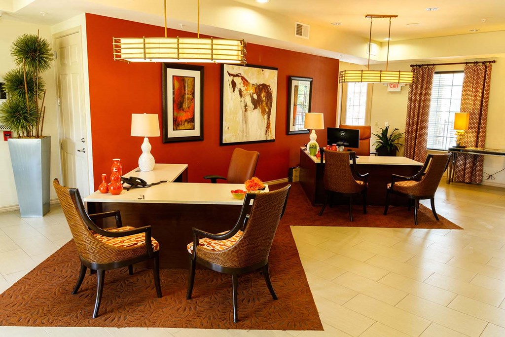 a dining room with a table and chairs