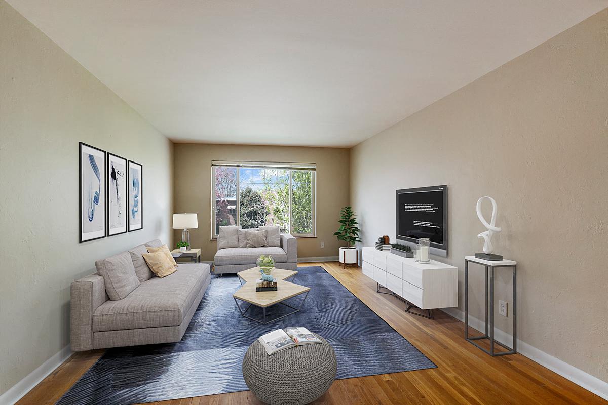 a living room with a couch and a table