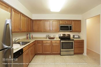Fully Equipped Kitchen at Town & Country Luxury Apartments, New York