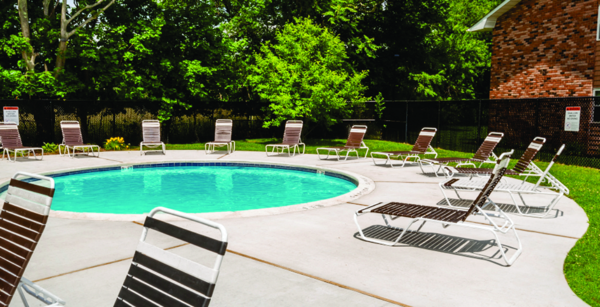 kiddie pool with sundeck chairs at Pinewood Village, Coram, 11727