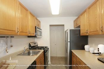 Fully Furnished Kitchen With Stainless Steel Appliances at Colony Park, Ronkonkoma, NY