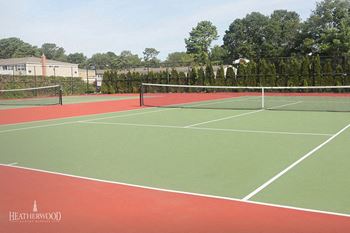 tennis court in the sun at Heatherwood House at Oakdale, Bohemia, NY