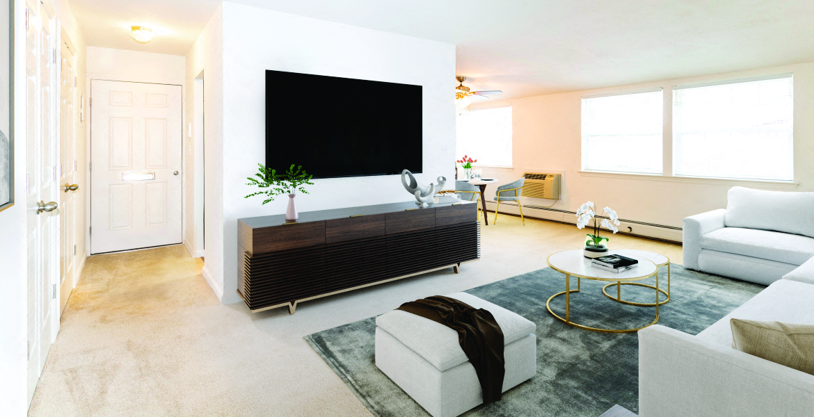 Living Room With TV at Heatherwood House at Patchogue, New York
