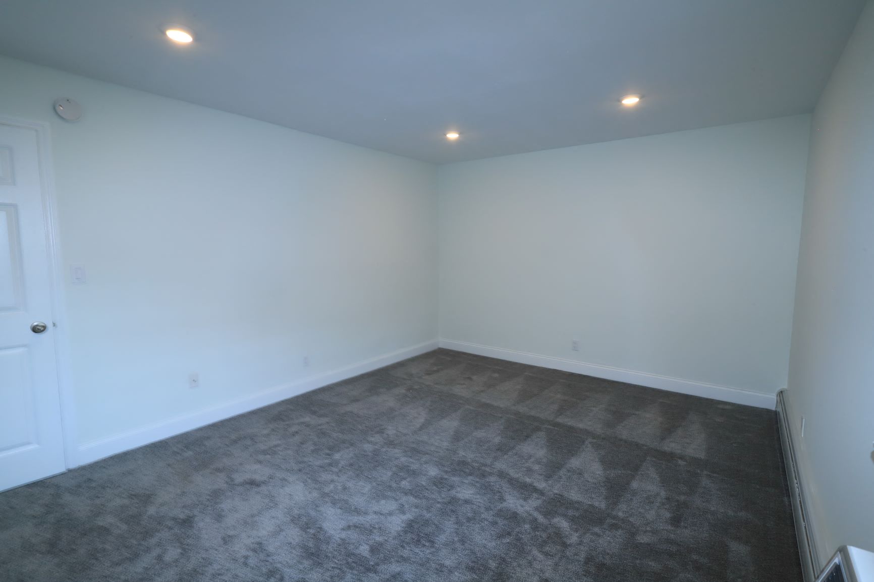 Bedroom of Upgraded Apartment at Heatherwood House at Port Jefferson, Port Jeff Station