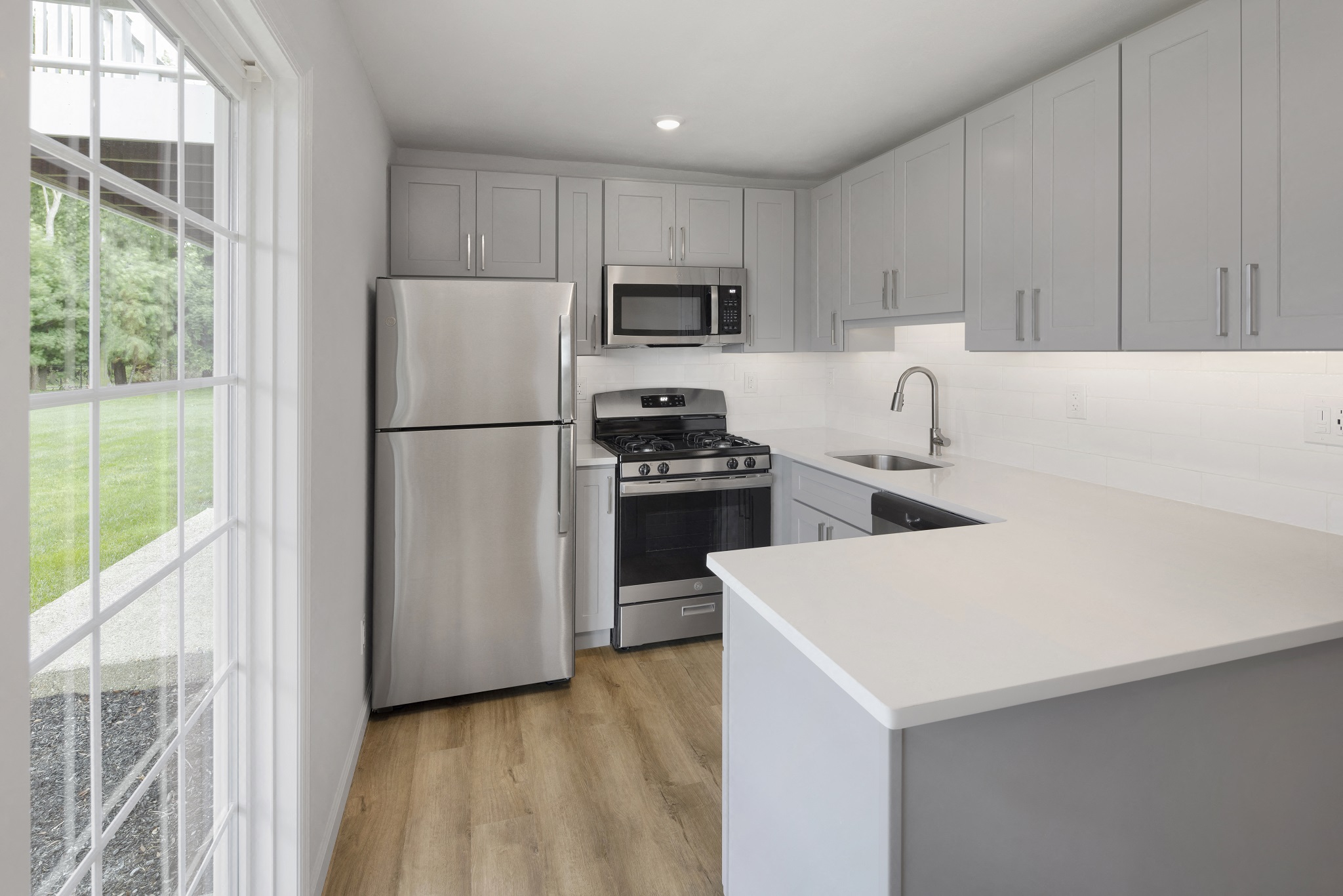 open concept kitchen with natural sunlight