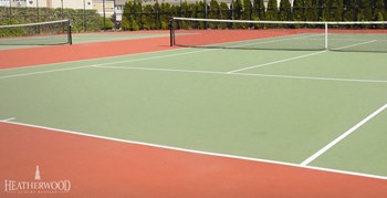 Tennis courts in the sun at Heatherwood House at Ronkonkoma, New York - Photo Gallery 10