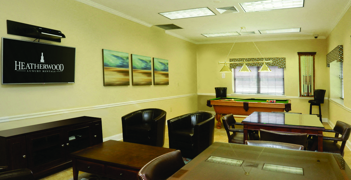 community center with card tables and billiards table at Lakeside Village, East Patchogue, New York