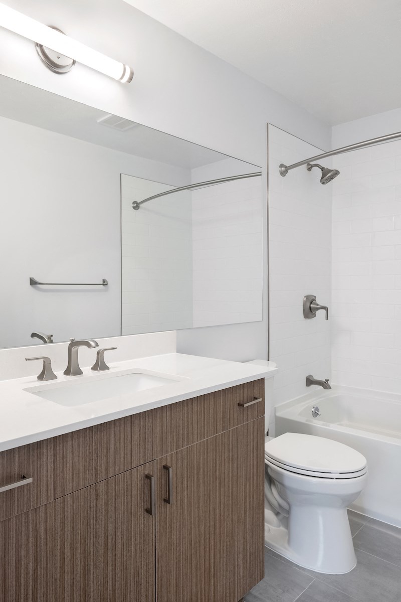 Bathroom with cupboards at Heritage Oyster Bay, East Norwich, NY