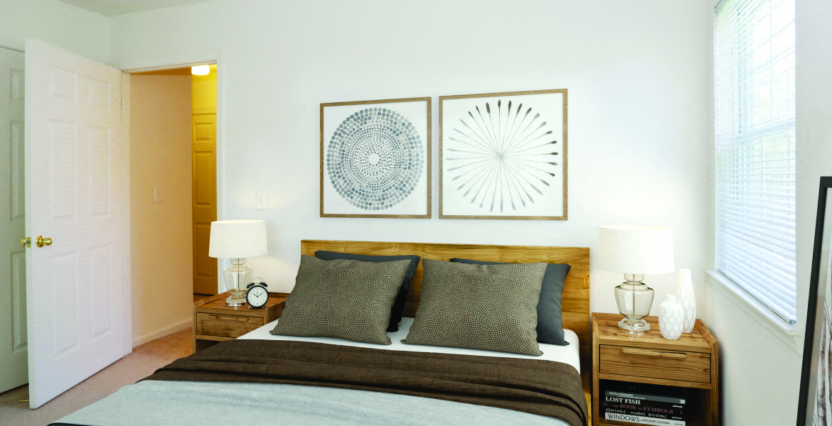 rustic looking bedroom with standard wood furniture at Mirror Pond, Moriches