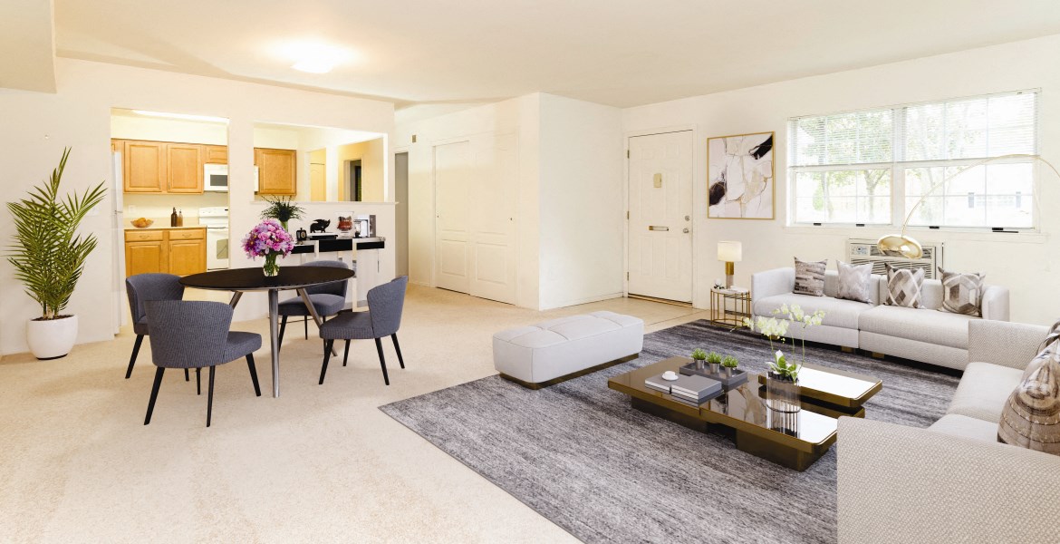 a living room with a couch and a table