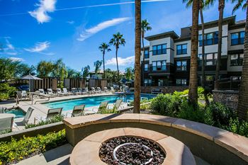 Outdoor Fire Pit by Pool at Apartments in Desert Ridge