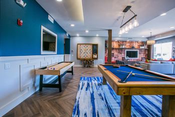 Game Room Complete with Billiards, Shuffleboard and Wall Scrabble at North Phoenix Apartment