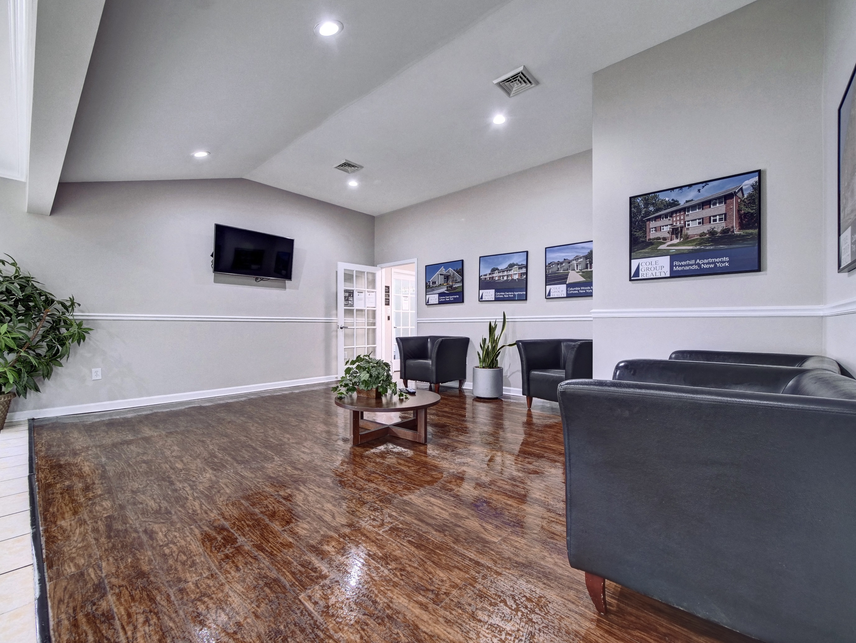 a living room with couches and a coffee table